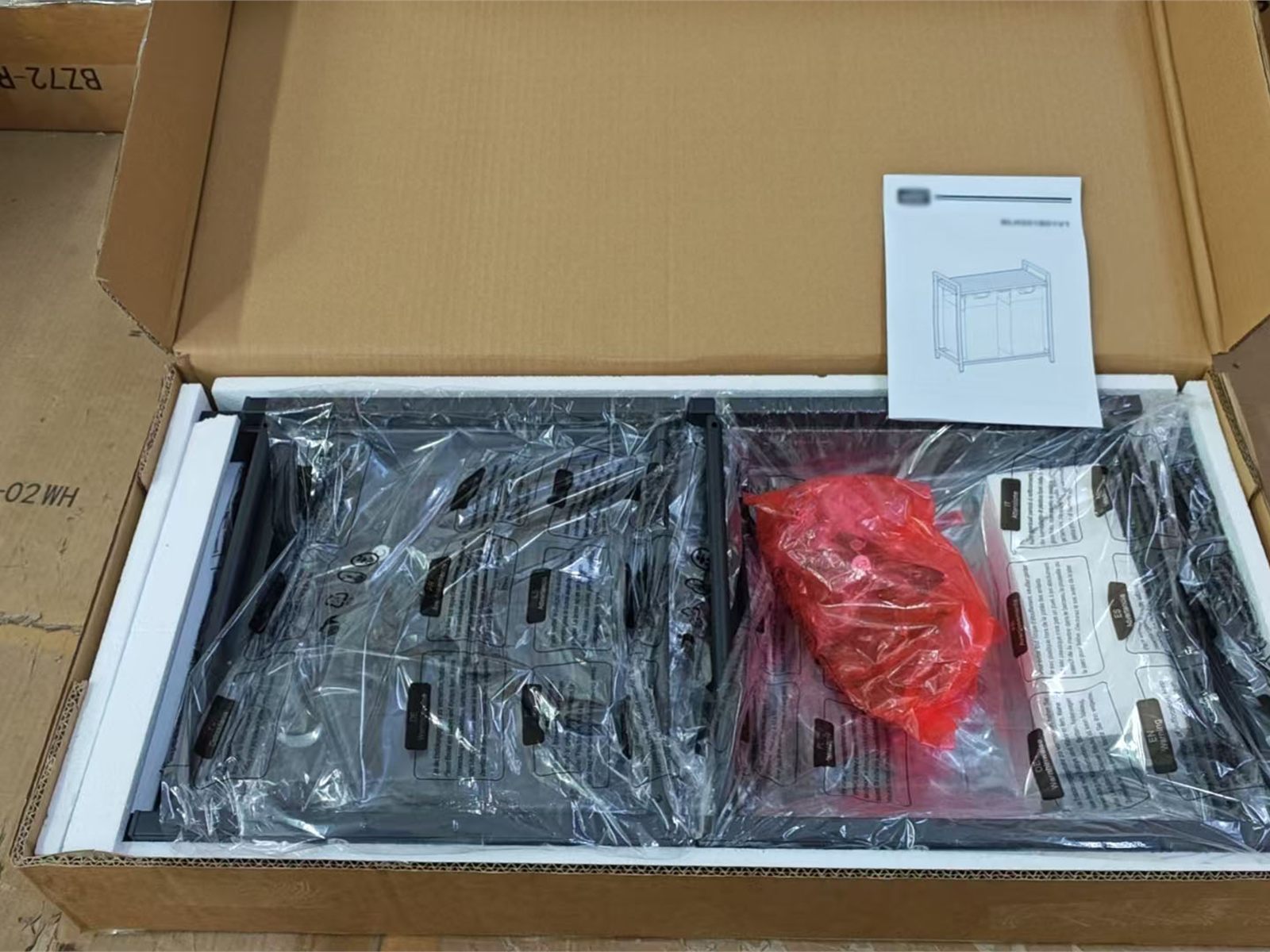 Flat-pack furniture packaging, labels and assembly documentation